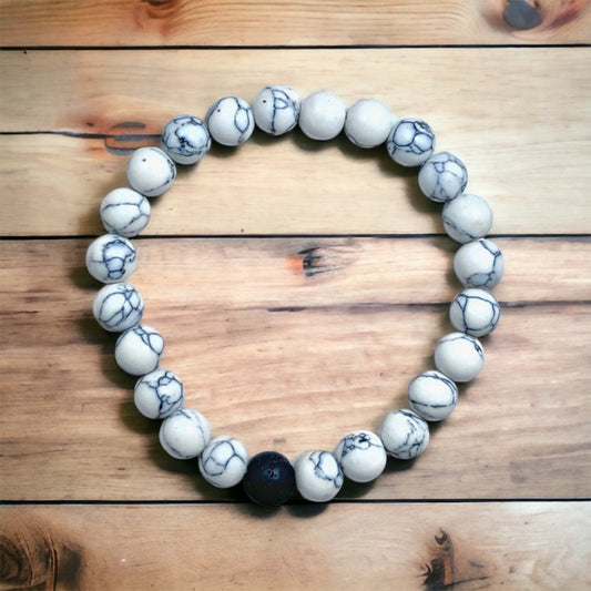 Pulsera de Howlita Blanca y piedra Volcánica.